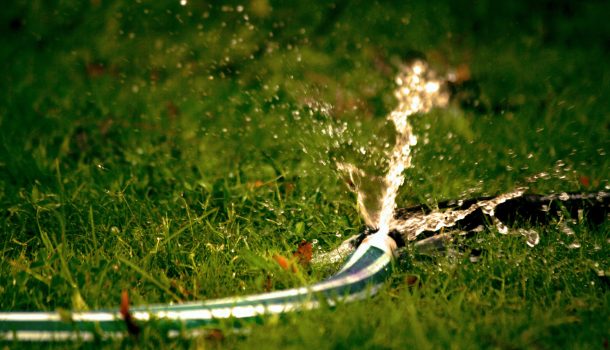 HOSES OFF: WATER BAN BACK ON