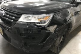 SQUAD CAR DAMAGED IN BARRON CO. CHASE