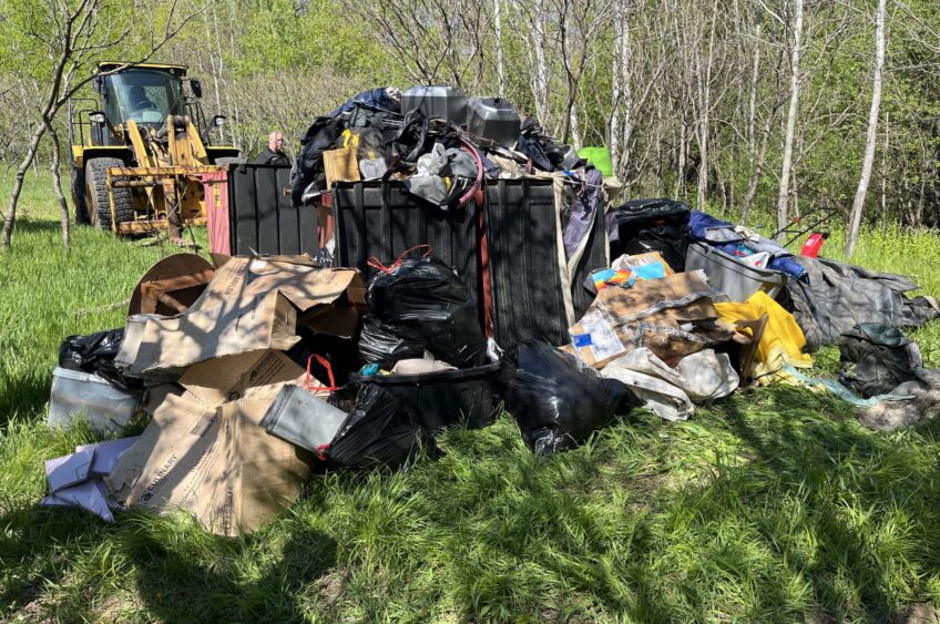 Looking Local: Dunn County Treatment Court Participants Mark National Treatment Court Month With Community Cleanup